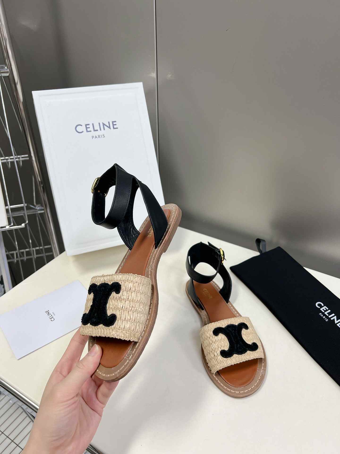 Ce1i*e Lympia Flat Strap Sandal In Raffia Black For Women 352402248C.02BL